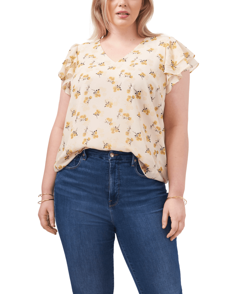 Front of a model wearing a size 0X Nora Flutter Sleeve Blouse in ISABELLE FLORAL-295 by 1.State. | dia_product_style_image_id:262683
